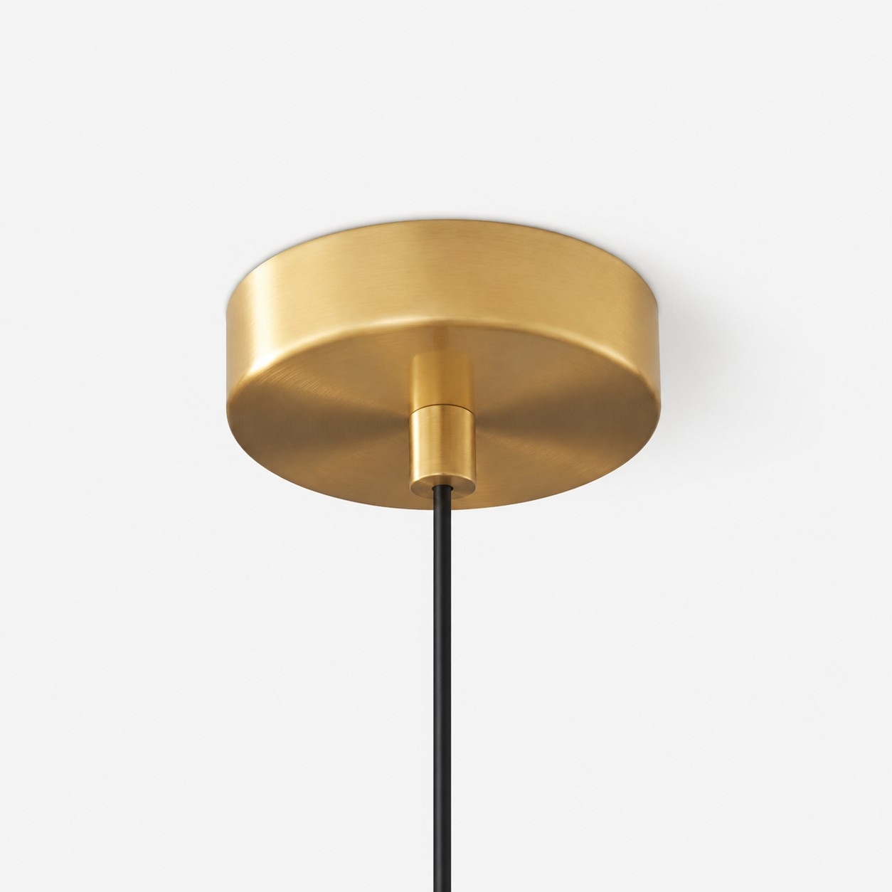 Detail: brass ceiling plate