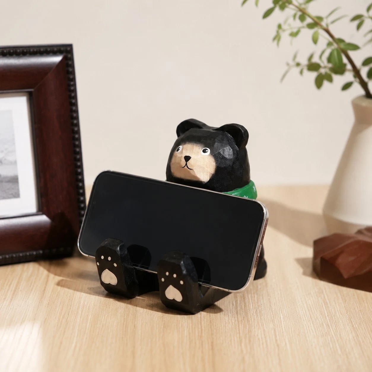 Wooden animal phone stand scene view