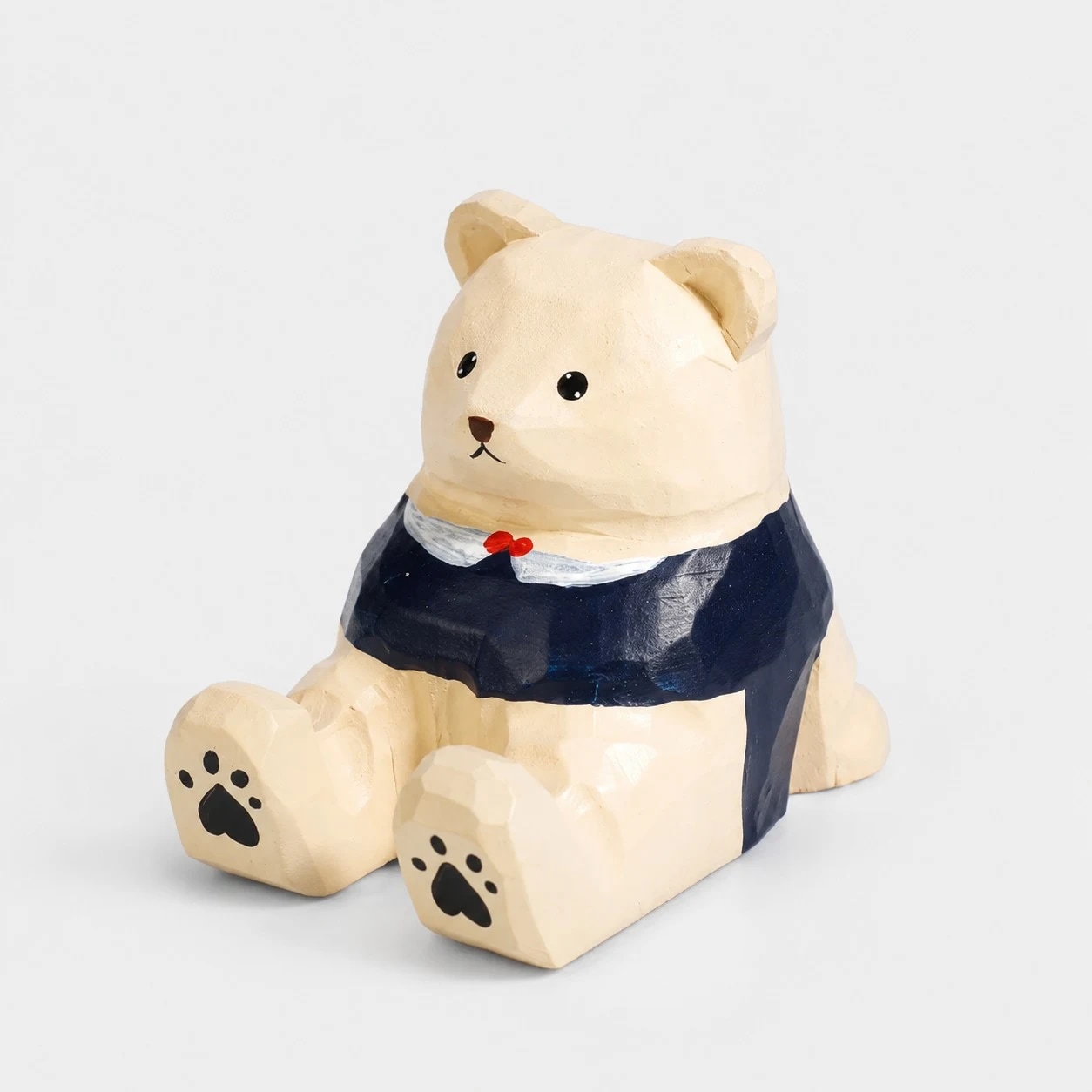Hand-carved wooden animal phone stand