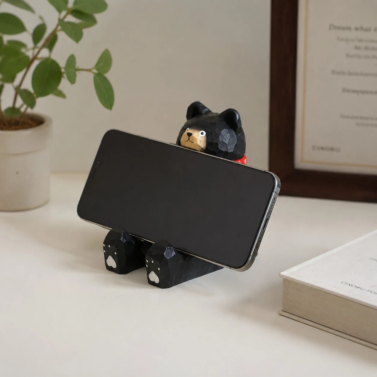 Wooden animal phone stand scene view