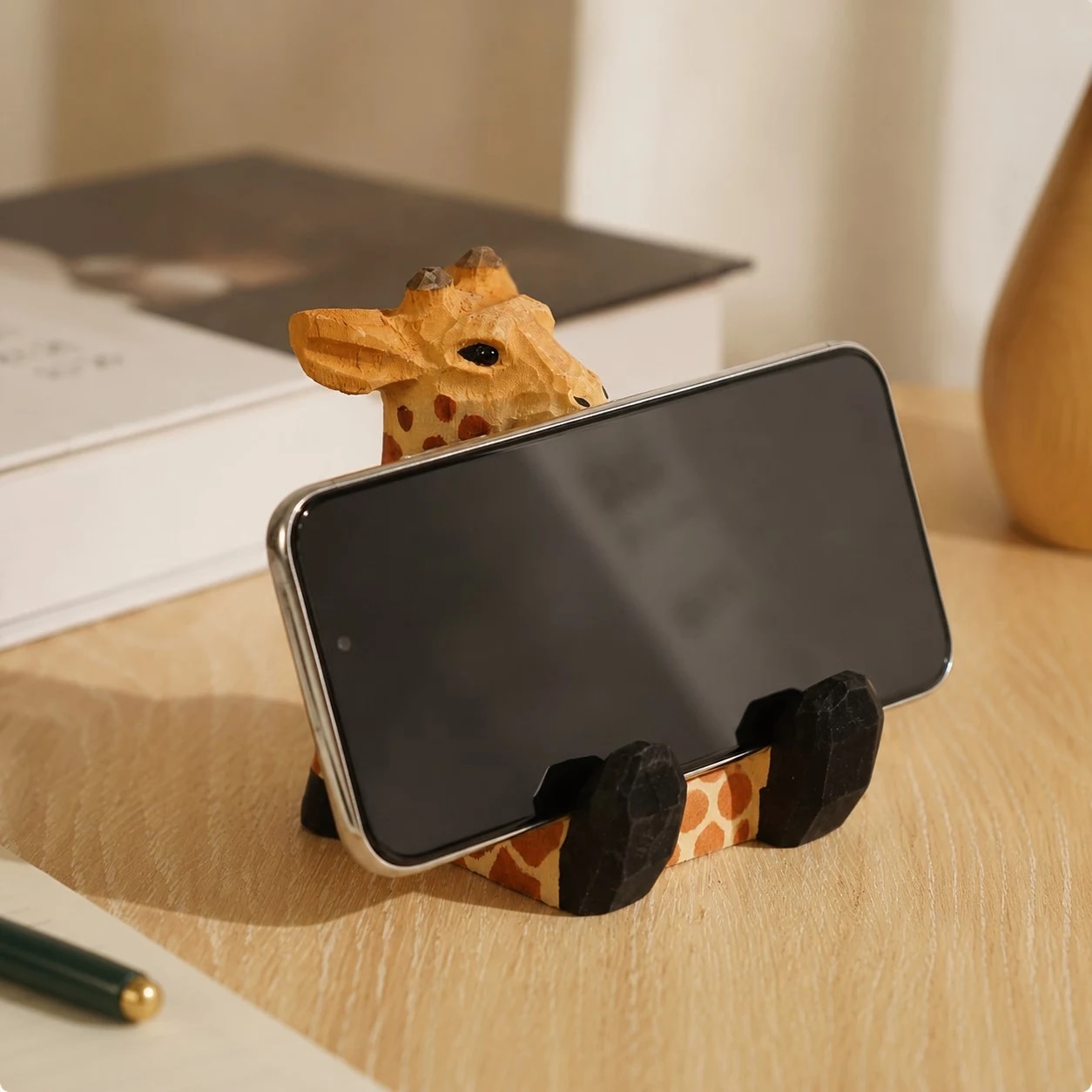 Wooden animal phone stand scene view