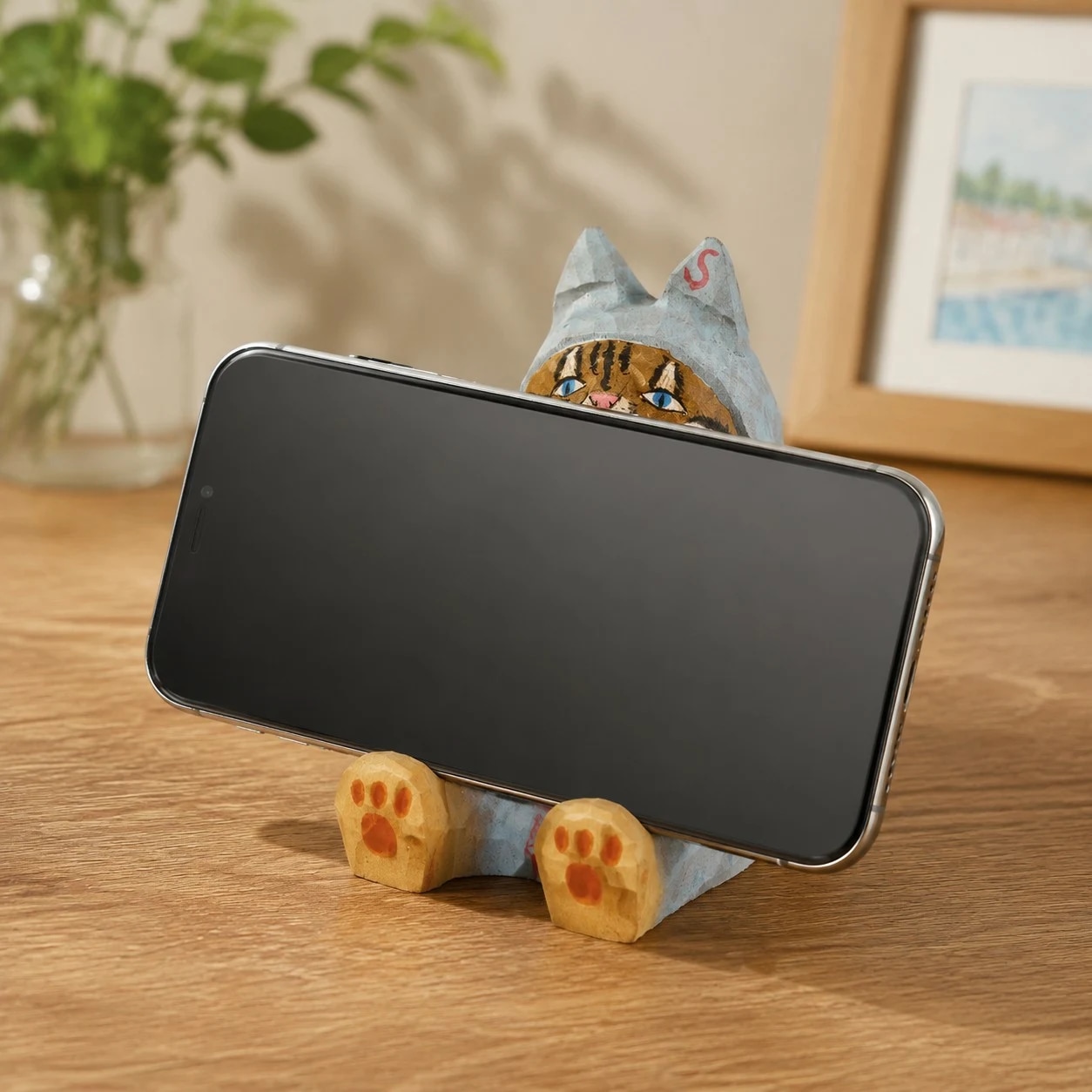 Wooden animal phone stand scene view