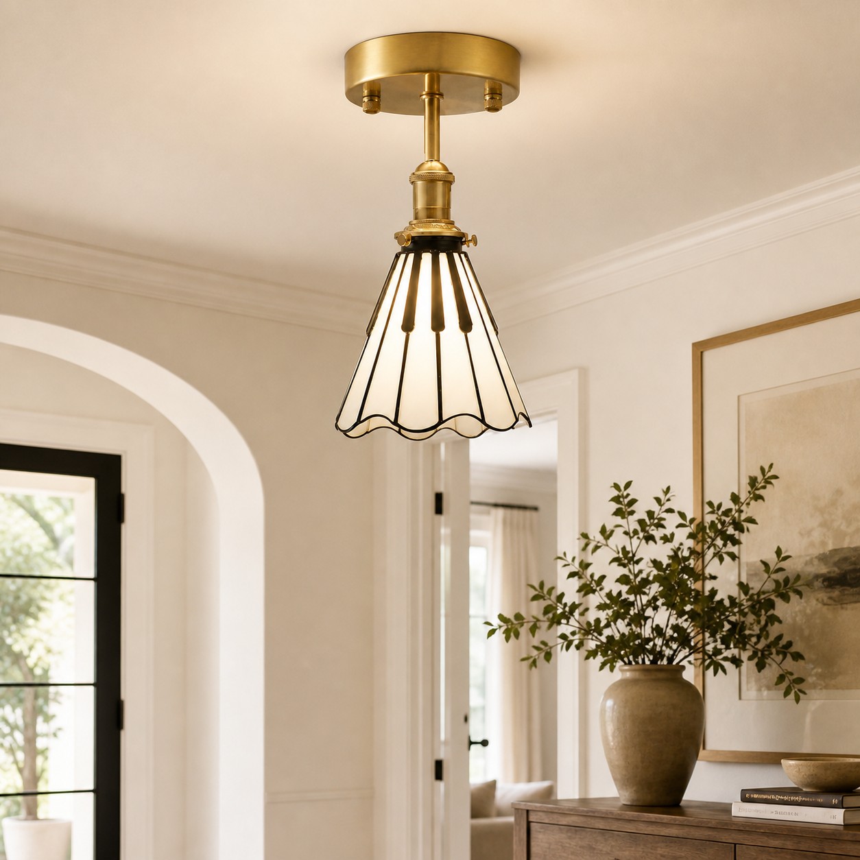 Piano key ceiling light installed near an interior archway