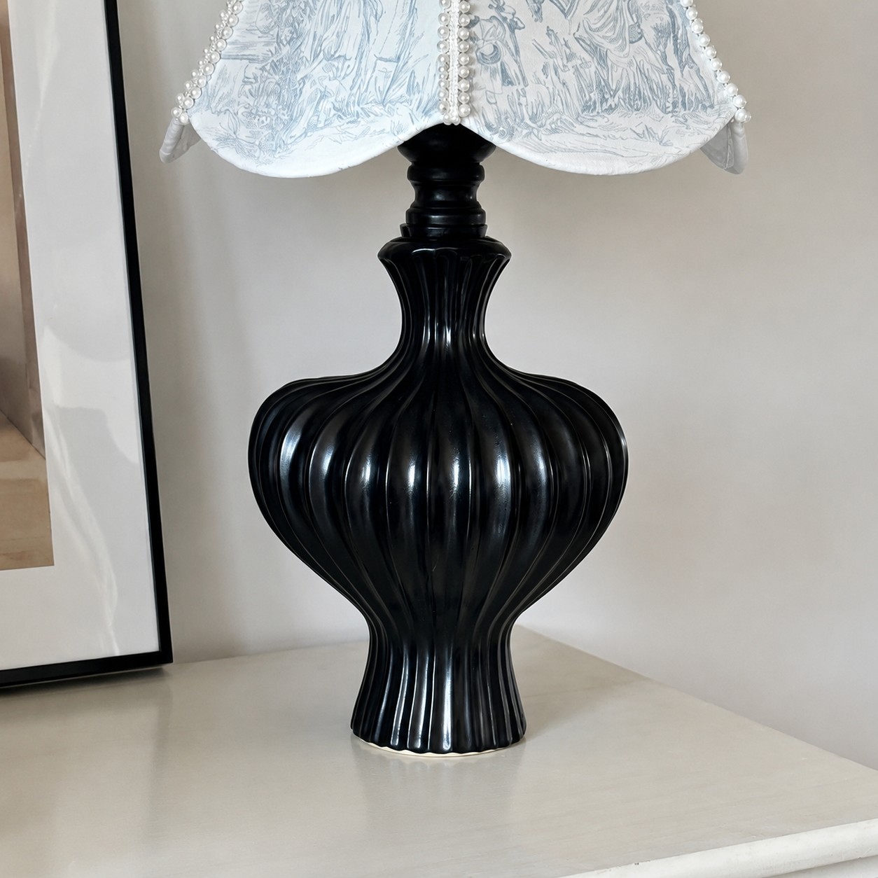 Black sculptural table lamp base detail