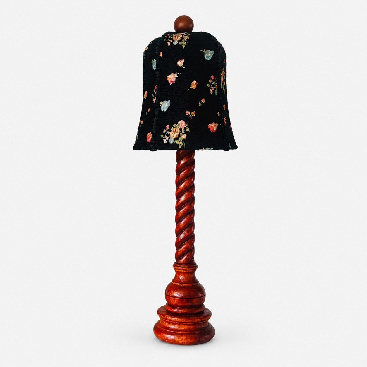 floral fabric and carved wood table lamp