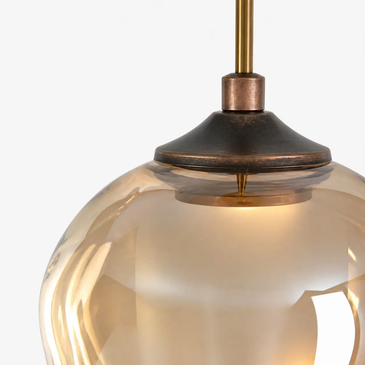 Close view of the shade connection and metal fitting